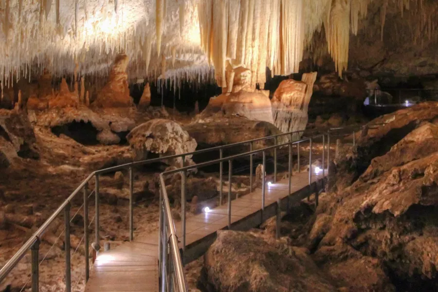 An lighted bridge in the middle of Mammoth Cave