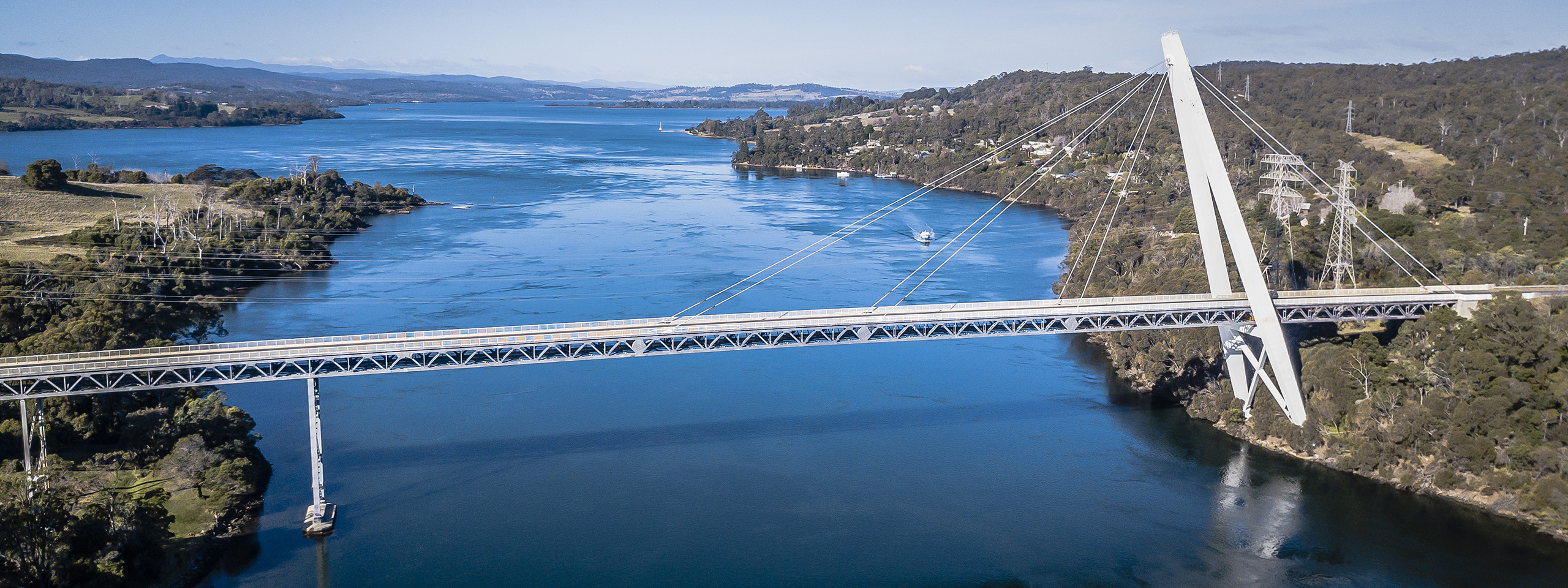An aerial view of a bridge over a river