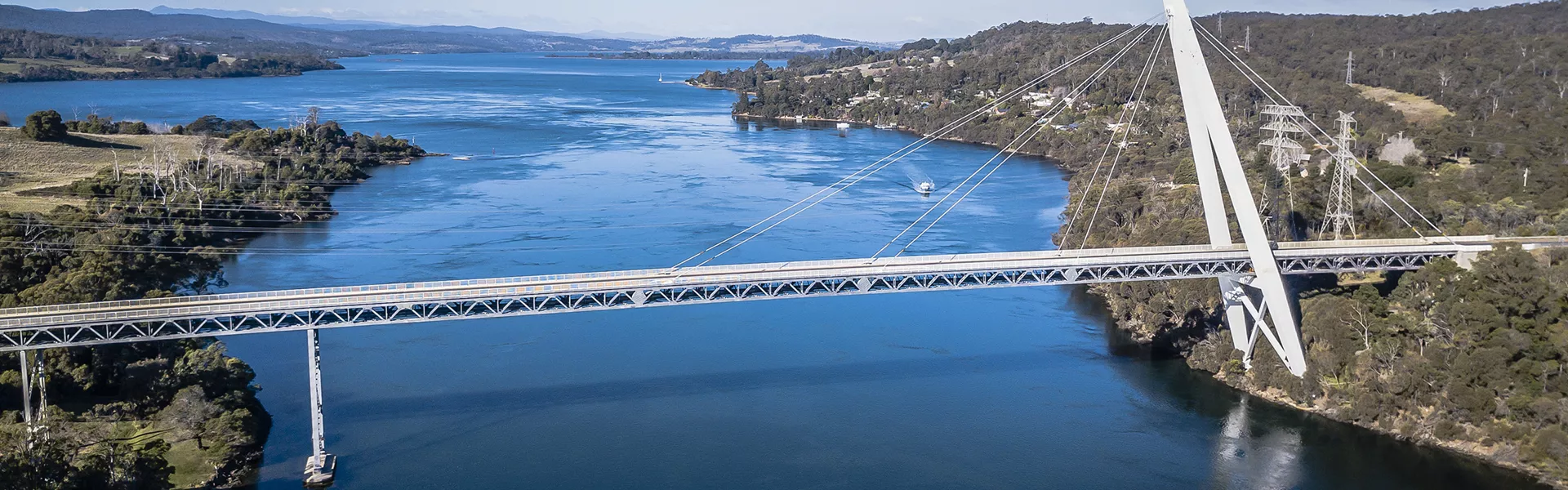 An aerial view of a bridge over a river