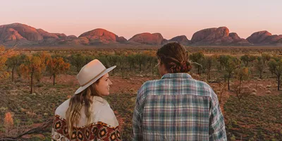 Couple Admiring Kata Tjuta - Credit: Helen Orr/ Tourism NT