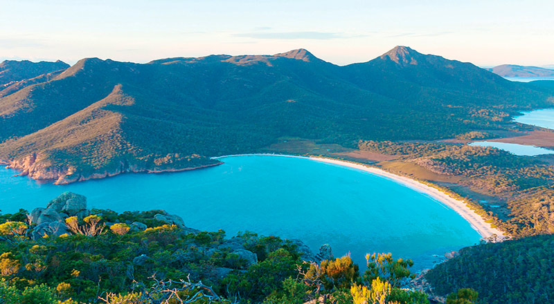 Landscape of Wineglass Bay in Freycinet National Park on sunny day