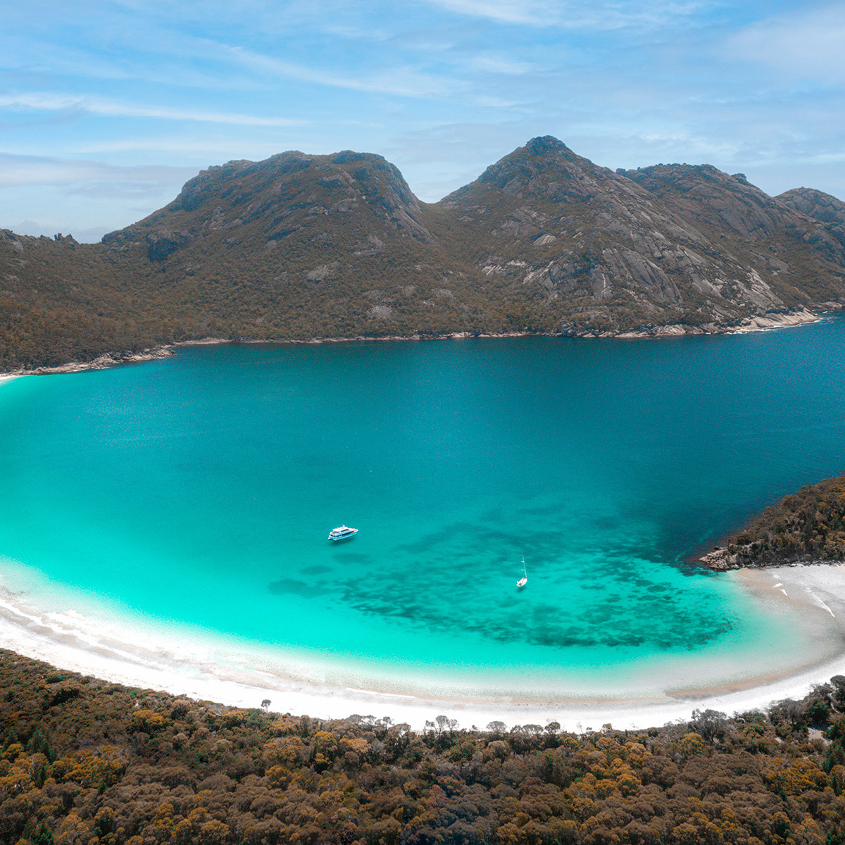 boat-in-wineglass-bay-credit-tourism-australia.jpg