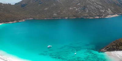 boat-in-wineglass-bay-credit-tourism-australia.jpg