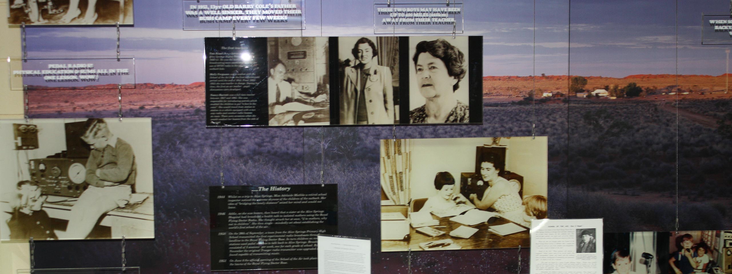 A wall with a bunch of pictures on it