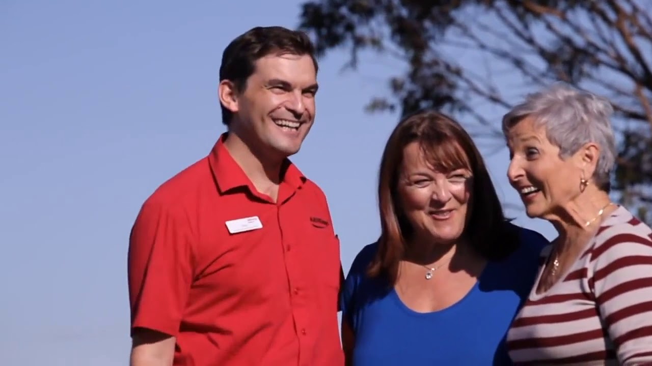 Travel Director Tony with two travellers