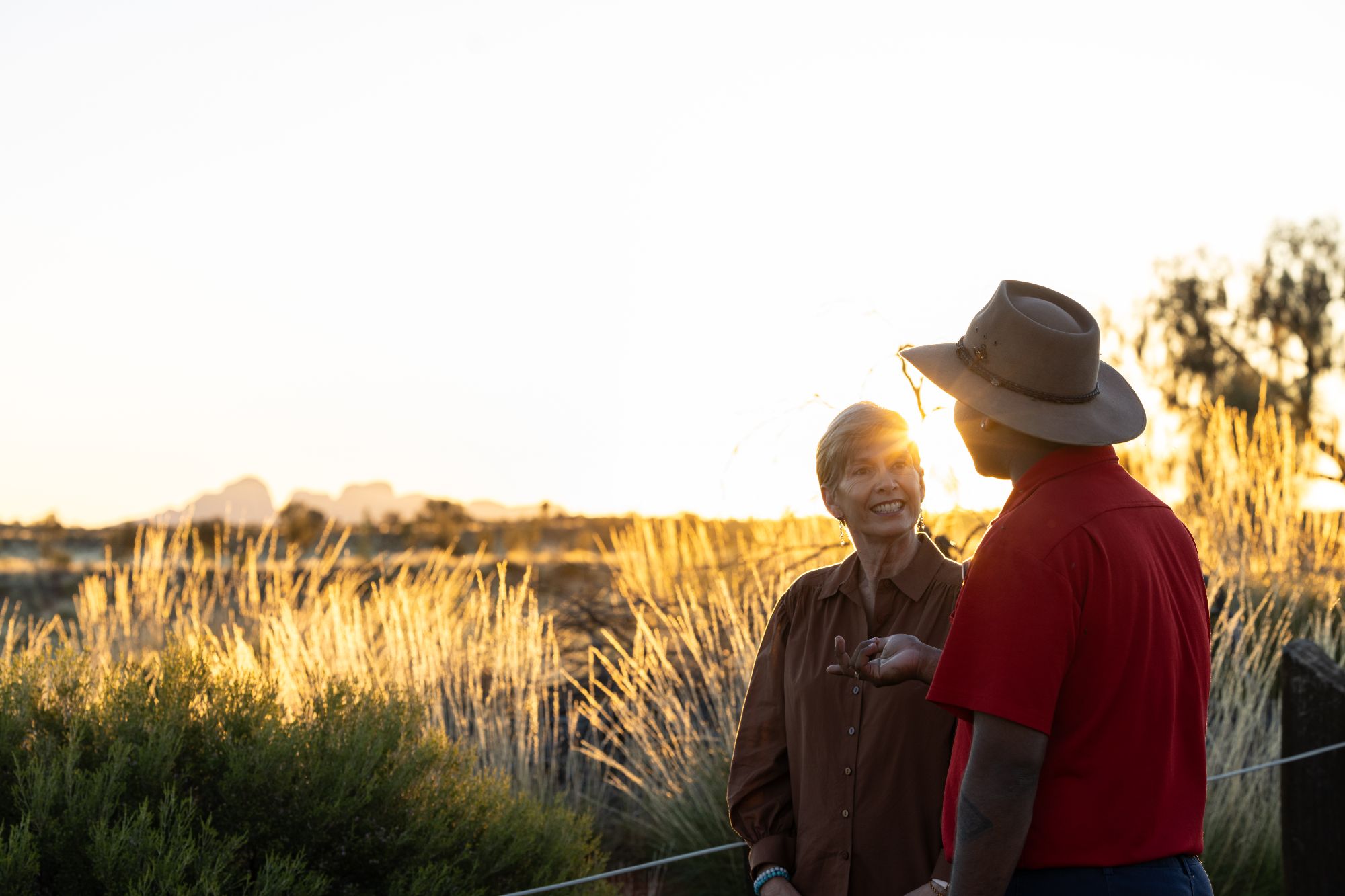 0E6A1851 A Woman Talks To A Guide In A Natural Area