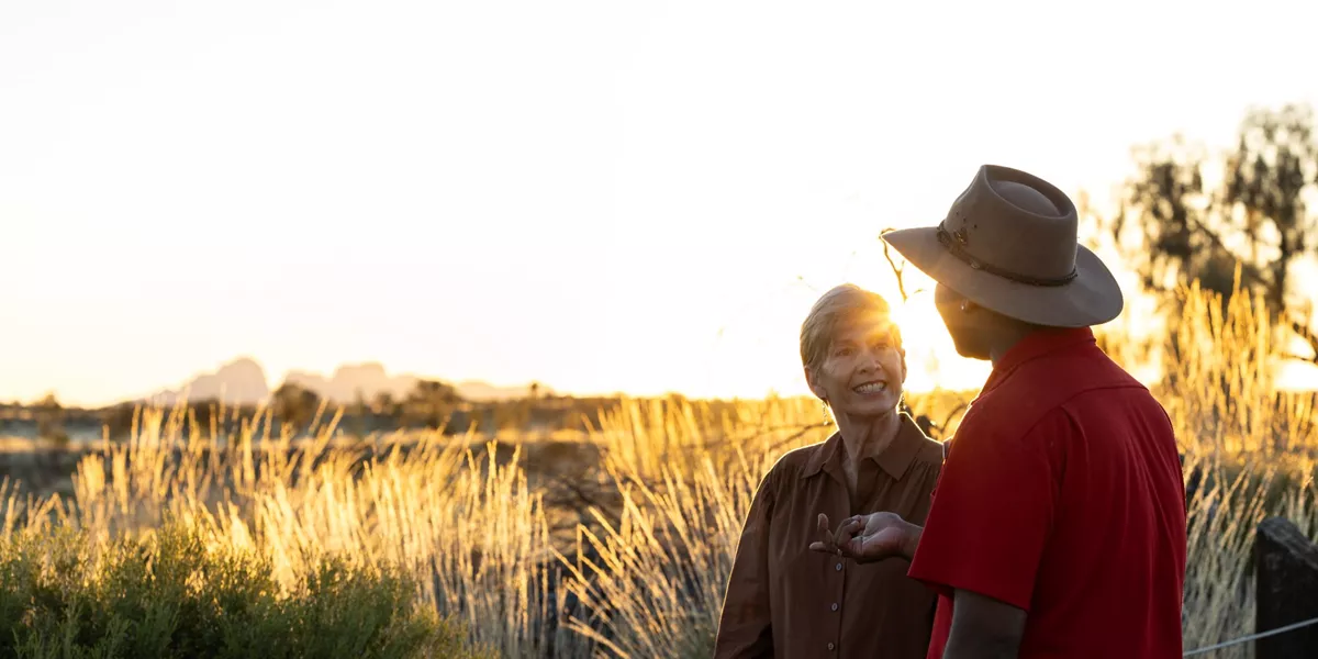 0E6A1851 A Woman Talks To A Guide In A Natural Area