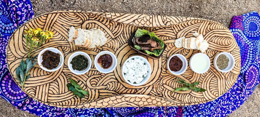 Native bush food displayed on the ground on the Kungkas Can Cook experience