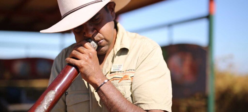 Nyul Nyul cultural guide from Kimberley Cultural Adventures playing the didgeridoo