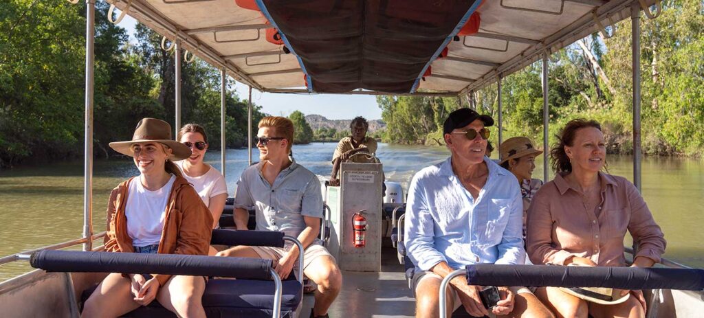 Guests on the Guluyambi Cultural Cruise in Kakadu with an Aboriginal cultural guide