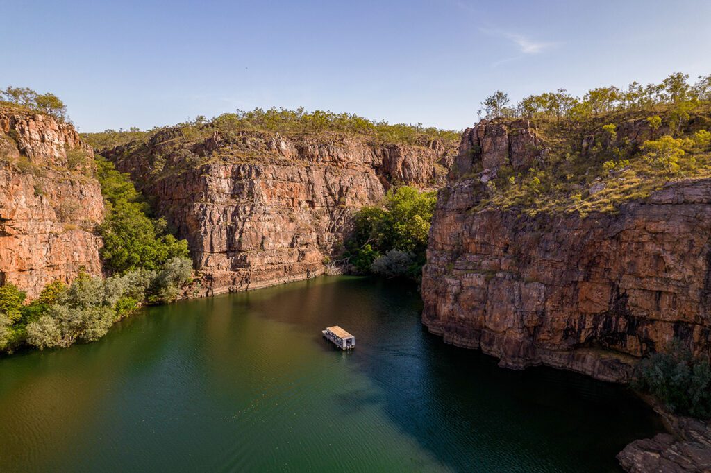 Boat sailing through Nitmiluk Gorge